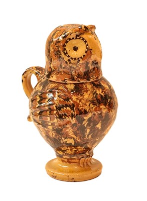 Lot 92 - A modern slip ware owl jug and cover with...