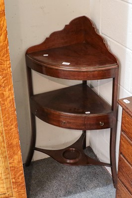 Lot 1206 - A George III three-tier mahogany corner...