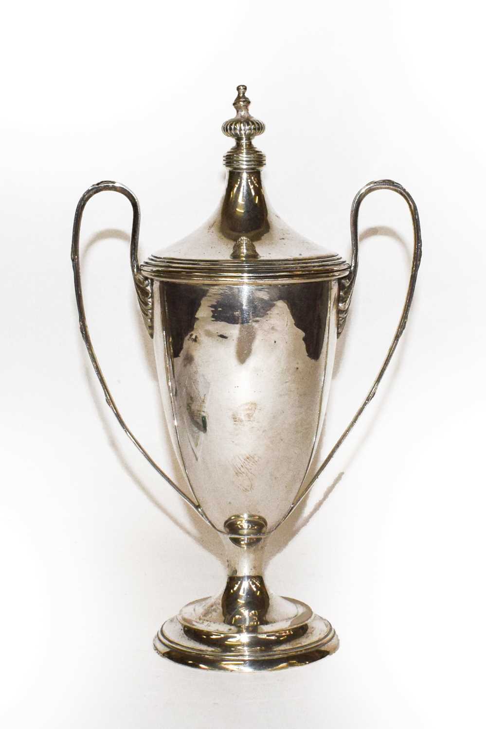 Lot 218 - A George V/American silver two-handled cup and...