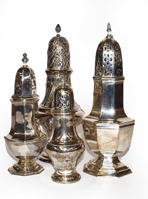 Lot 219 - A collection of four assorted silver casters,...