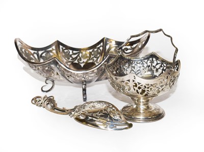 Lot 220 - Two differing pierced silver baskets and a...