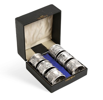 Lot 2137 - A Cased Set of Silver Napkin-Rings