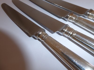 Lot 2022 - A Set of Twenty-Two Elizabeth II Silver Table-Knives and Eleven Cheese-Knives