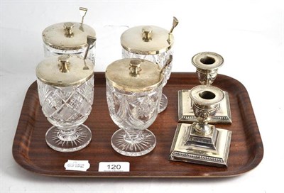 Lot 120 - Pair of silver dwarf candlesticks; and a set of four cut glass dessert glasses with silver...