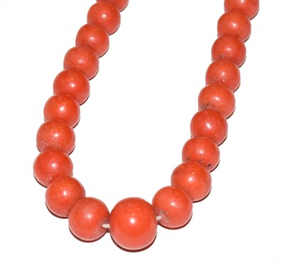 Lot 70 - A graduated coral bead necklace, clasp stamped...