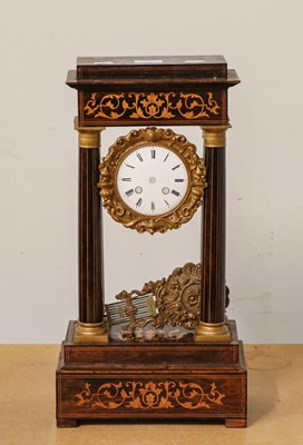 Lot 1229A - A selection of clocks consisting of a brass...