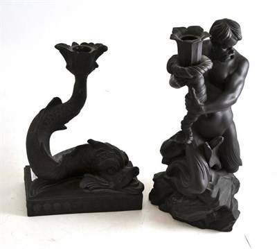 Lot 131 - A Wedgwood (made in England) black basalt figural candlestick modelled as Neptune, number 106...