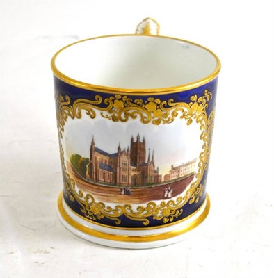 Lot 137 - A Chamberlains Worcester blue ground mug decorated with Worcester Cathedral