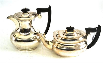 Lot 141 - Silver teapot and hot water jug, by E.V, Sheffield 1928