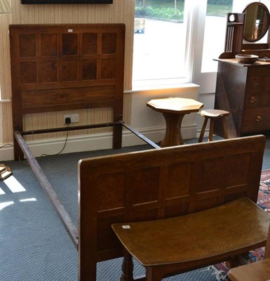 Lot 977 - A Yorkshire School Burr Oak 3'6 " Panelled Bedstead, the headboard and footboard with different...