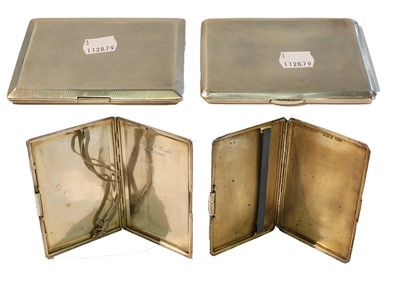Lot 230 - Two silver cigarette cases, each oblong and...