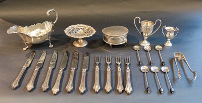 Lot 301 - A collection of silver, including: a sauceboat,...