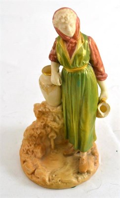 Lot 148 - Royal Worcester figure of a female water carrier