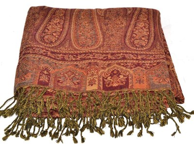 Lot 159 - A large woven red ground Paisley type shawl