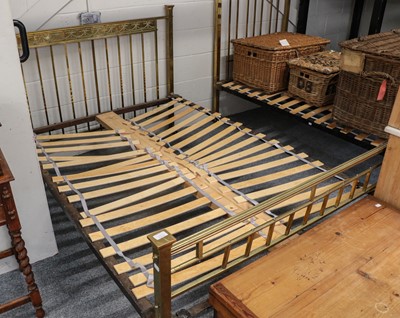 Lot 1165 - A 1920's brass framed double bed, decorated to...