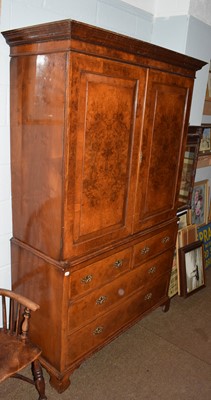 Lot 1250 - A 19th century burr walnut linen press with...