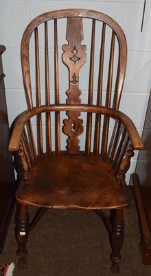 Lot 1251 - A 19th century ash & elm Windsor armchair with...