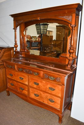 Lot 1260 - An Edwardian walnut and mahogany mirror backed...