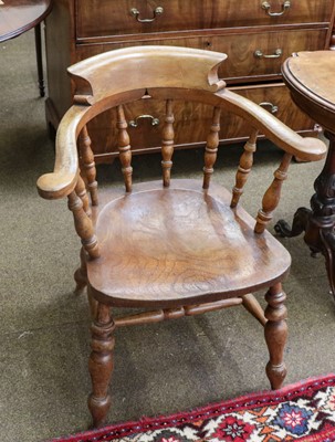 Lot 1308 - A trio of High Wycombe oak captains chairs (3)