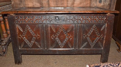 Lot 1287 - A 17th century oak three-panel coffer, 128cm...