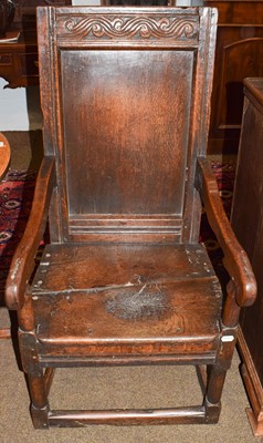 Lot 1293 - A 17th century oak Wainscot chair with carved...