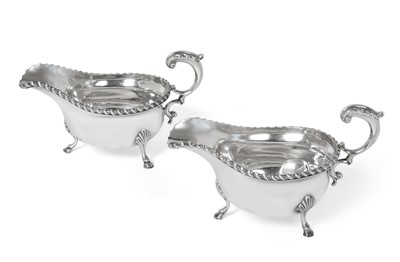 Lot 2121 - A Pair of George V Silver Sauceboats