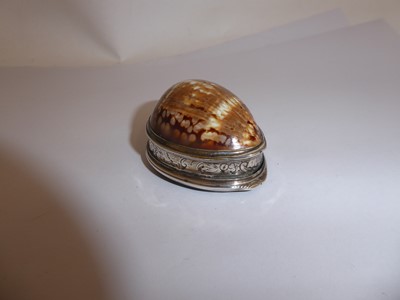 Lot 2064 - A George II Silver-Mounted Cowrie Shell Snuff-Box