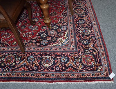 Lot 1232 - Kashan carpet, the raspberry field of vines...