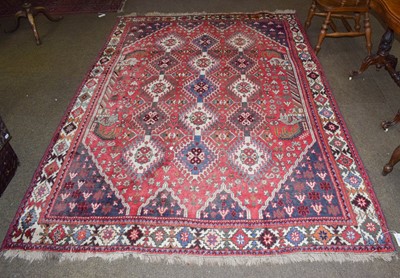 Lot 1240 - A Kashgai rug, the raspberry field with...