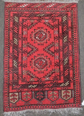 Lot 1246 - Afghan Turkman prayer rug, the crimson field...