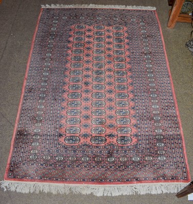 Lot 1247 - Pakistani Bukhara rug, the soft rose pink...