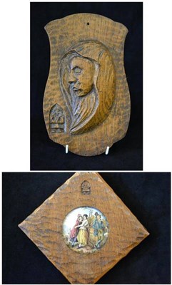 Lot 980 - A Thomas  "Gnomeman " Whittaker Oak Plaque, carved with the profile of a figure, with carved...