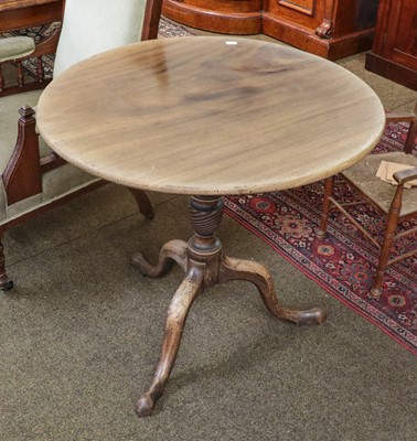 Lot 1339 - A George III oak snap top tripod table, 95cm...