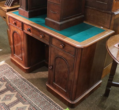 Lot 1331 - A Victorian mahogany kneehole desk, 123cm by...