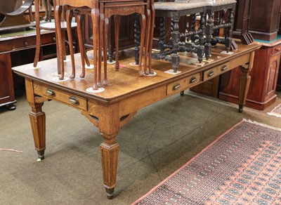 Lot 1360 - A Victorian oak four drawer library table,...