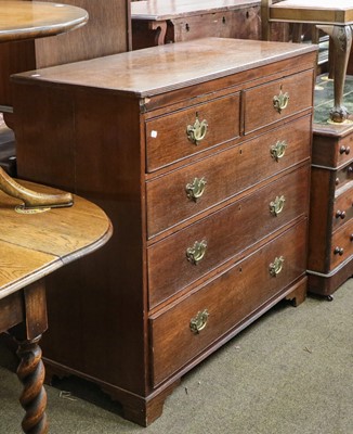 Lot 1322 - A 19th century oak four-height chest of...