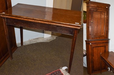 Lot 1333 - Two George III oak corner cupboards banded in...