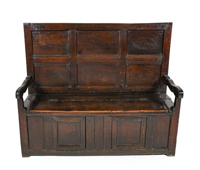 Lot 1370 - A Joined Oak Box Settle, the back support with...