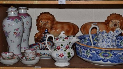 Lot 195 - A pair of Staffordshire lions on moulded bases, Masons wash bowl, blue and white water jug, tray of