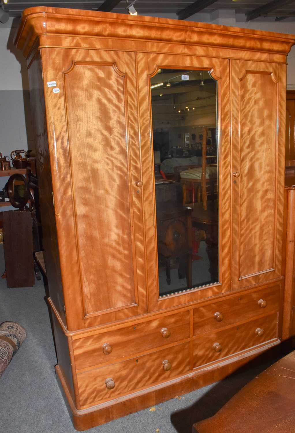 Lot 1381 - A Victorian satin birch mirrored wardrobe,...