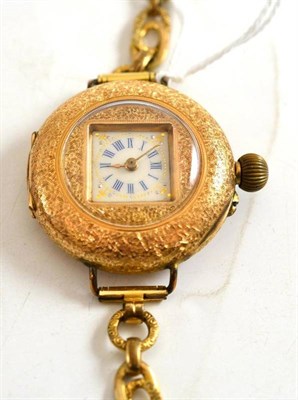 Lot 205 - A fob watch converted to a wristwatch stamped '14K'