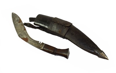 Lot 3139 - An Indian Kukri, the single edge curved steel...