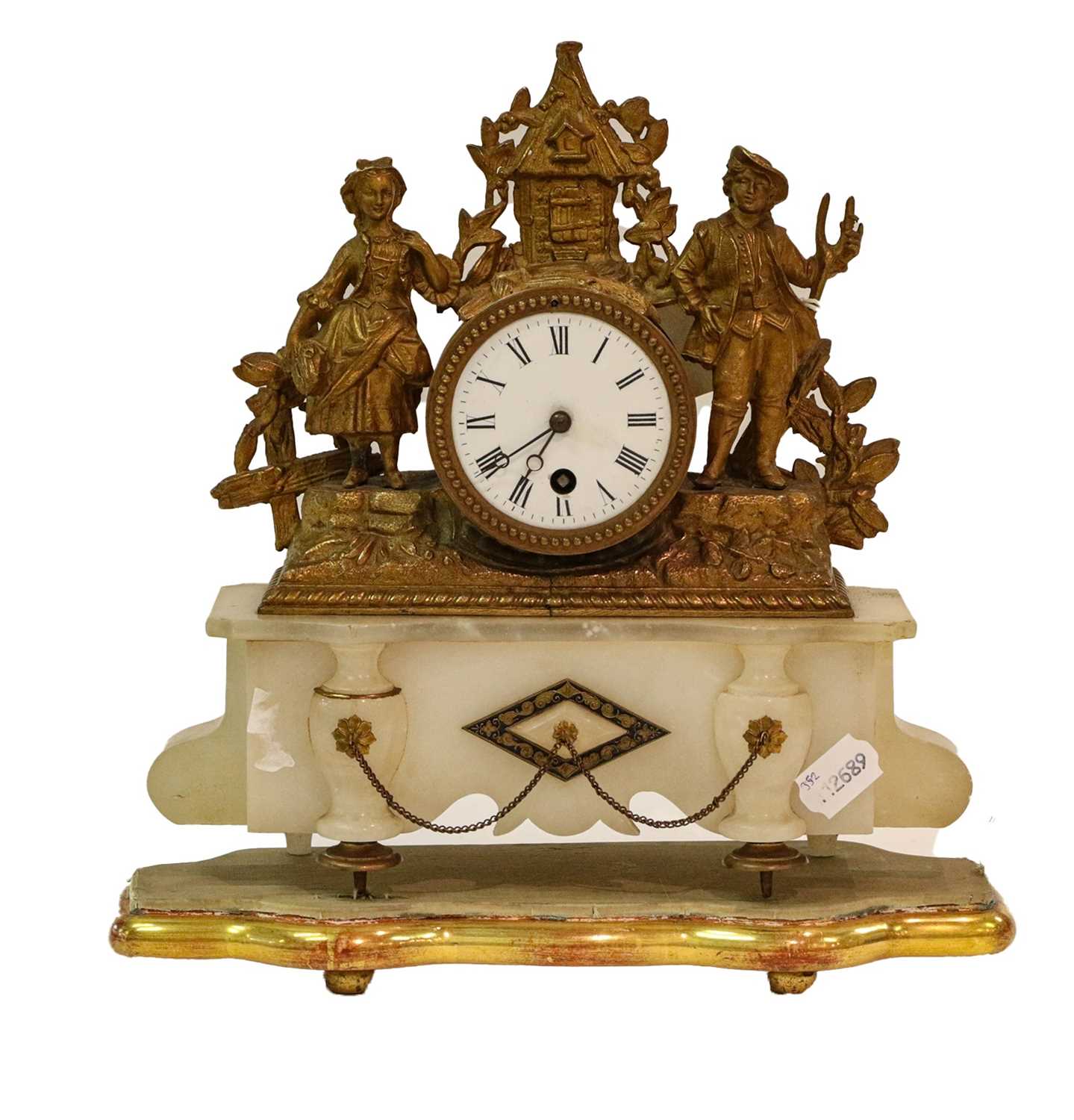 Lot 329 - A late 19th century gilt metal and alabaster...