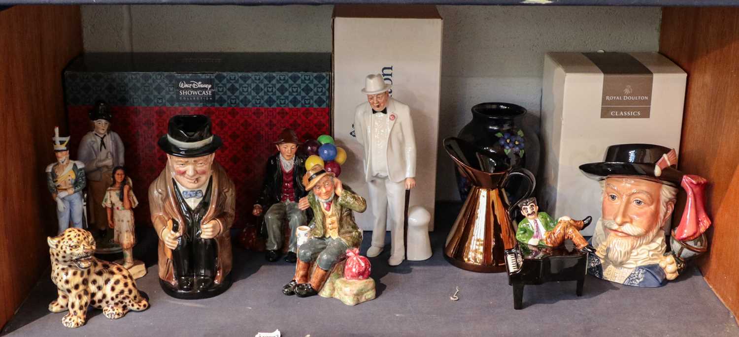 Lot 270 - A collection of Royal Doulton character jugs...