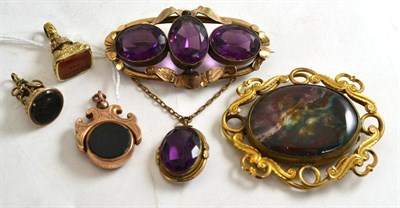 Lot 218 - A Victorian brooch, a moss agate brooch (a.f.), two seal fobs and a swivel fob