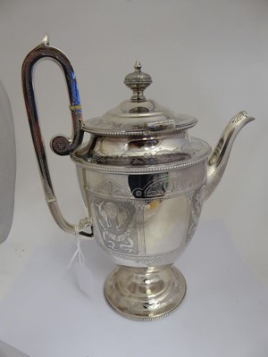 Lot 2100 - A Four-Piece Victorian Silver Plate Tea and Coffee-Service