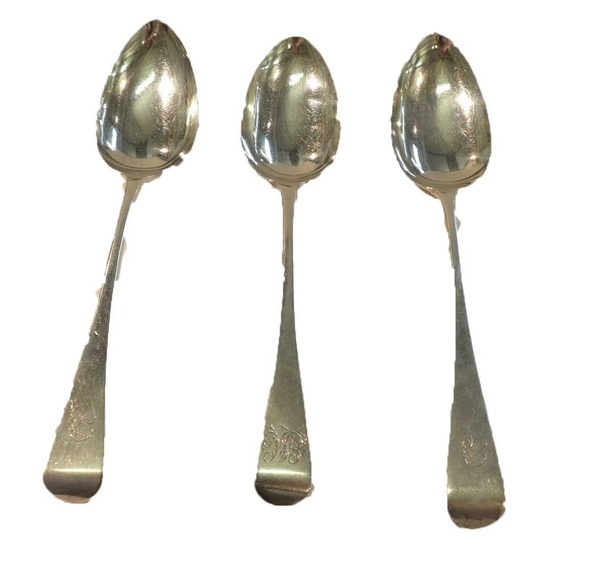 Lot 219 - Three George III silver serving spoons, two by...