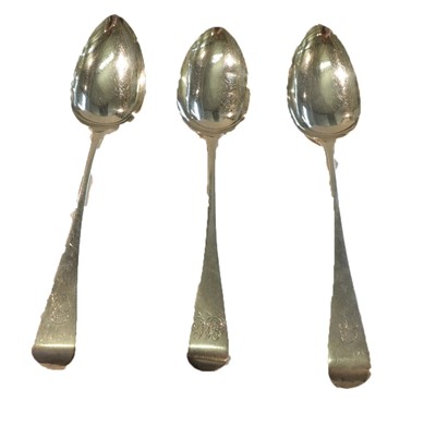 Lot 219 - Three George III silver serving spoons, two...