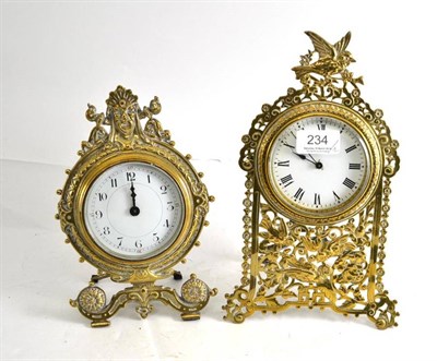 Lot 234 - Two brass easel timepieces