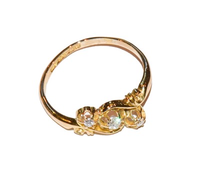 Lot 93 - An 18 carat gold diamond three stone ring,...